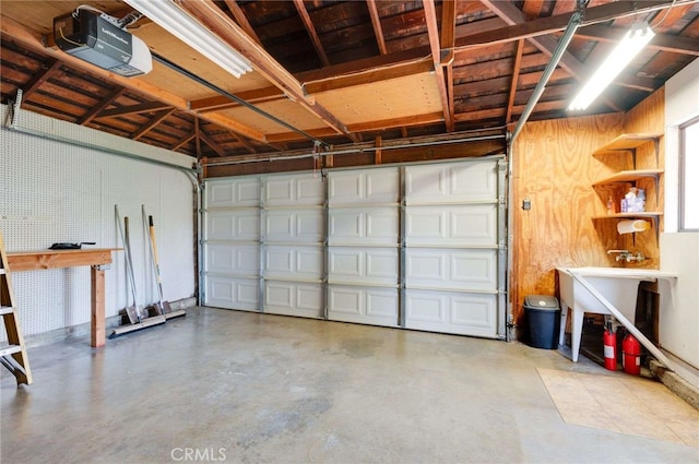 5856 E Scrivener St, Long Beach, CA 90808 - garage featuring a garage door opener