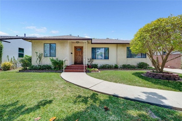 5856 E Scrivener St, Long Beach, CA 90808 - view of front of house with a front lawn and stucco siding