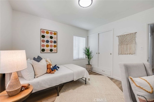 5856 E Scrivener St, Long Beach, CA 90808 - bedroom with wood finished floors and a closet