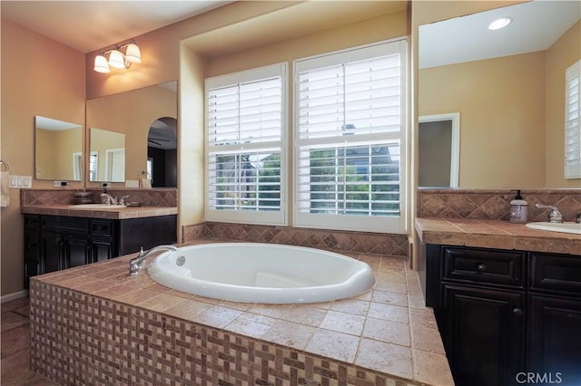 1759 Crebs Way, Upland, CA 91784 - bathroom with healthy amount of natural light, a bath, and two vanities