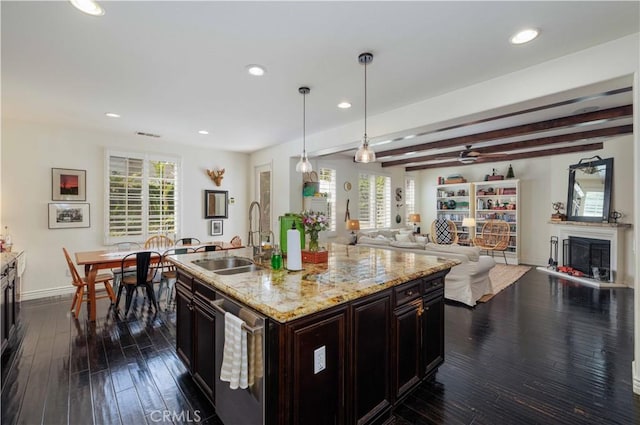 1759 Crebs Way, Upland, CA 91784 - kitchen with dishwasher, recessed lighting, dark wood finished floors, light stone counters, and a fireplace