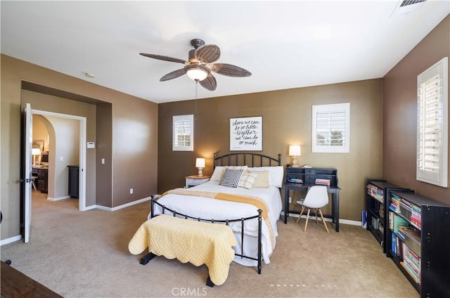 1759 Crebs Way, Upland, CA 91784 - bedroom with light colored carpet, a ceiling fan, and arched walkways