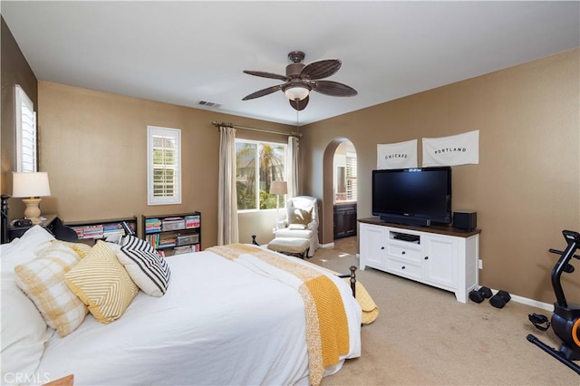 1759 Crebs Way, Upland, CA 91784 - bedroom featuring light carpet, arched walkways, and a ceiling fan