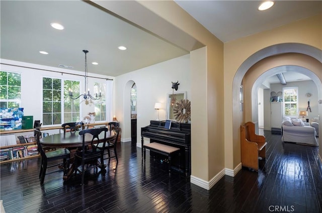 1759 Crebs Way, Upland, CA 91784 - dining area featuring a chandelier, wood finished floors, recessed lighting, healthy amount of natural light, and arched walkways