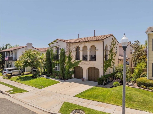 1759 Crebs Way, Upland, CA 91784 - mediterranean / spanish home featuring an attached garage, driveway, stucco siding, and a front yard
