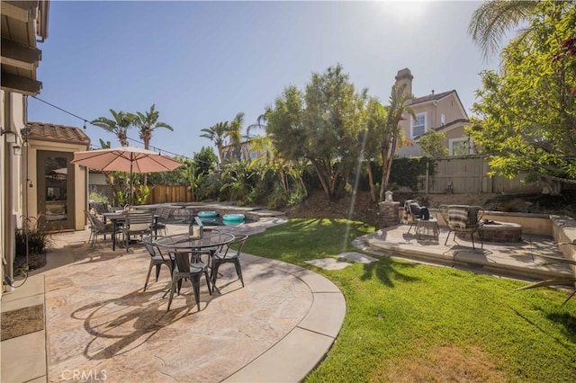 1759 Crebs Way, Upland, CA 91784 - fenced backyard with a patio area, a fire pit, and outdoor dining area