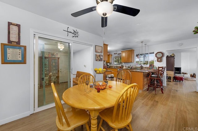 7215 San Pasqual St, Lemon Grove, CA 91945 - dining space with light wood-style flooring and ceiling fan