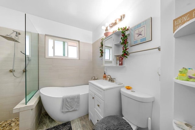 7215 San Pasqual St, Lemon Grove, CA 91945 - full bathroom with a freestanding tub, vanity, a tile shower, and wood finished floors