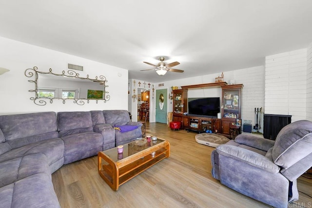 7215 San Pasqual St, Lemon Grove, CA 91945 - living room with wood finished floors and ceiling fan