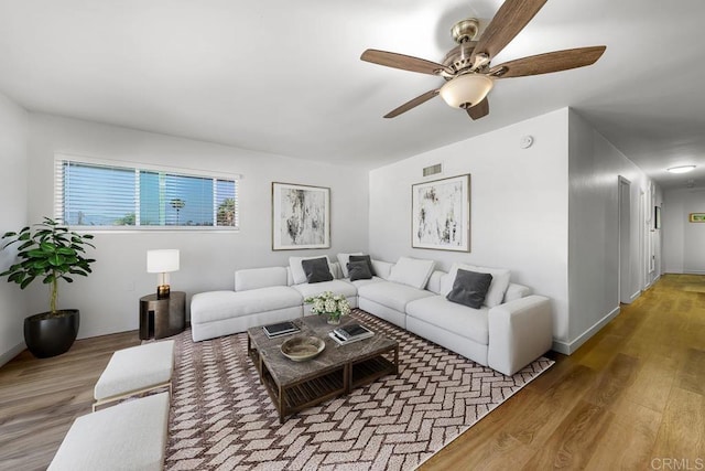7215 San Pasqual St, Lemon Grove, CA 91945 - living area featuring ceiling fan and wood finished floors