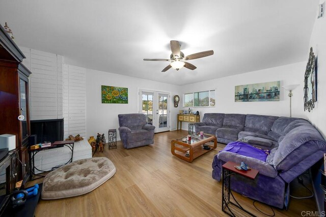 7215 San Pasqual St, Lemon Grove, CA 91945 - living room featuring ceiling fan and wood finished floors