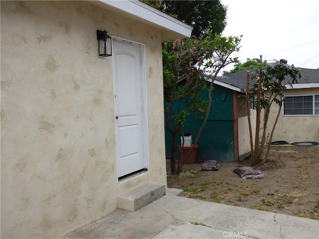 630 W Santa Cruz St, San Pedro, CA 90731 - property entrance featuring stucco siding