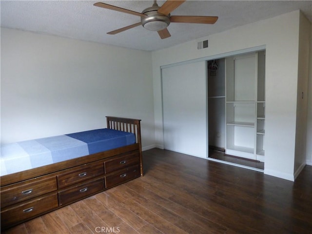 630 W Santa Cruz St, San Pedro, CA 90731 - unfurnished bedroom featuring wood finished floors, a closet, and a ceiling fan