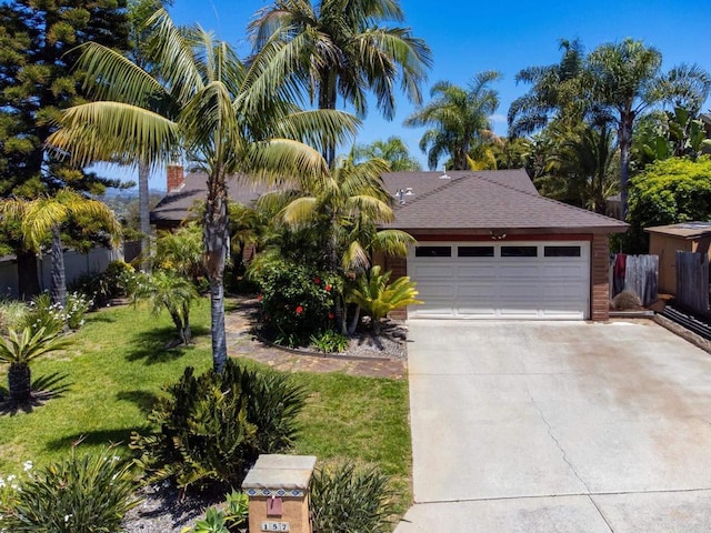 157 Beechtree Dr, Encinitas, CA 92024 - view of front of house featuring concrete driveway, an attached garage, and roof with shingles