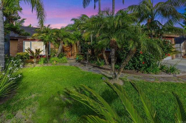 157 Beechtree Dr, Encinitas, CA 92024 - yard at dusk featuring a lawn