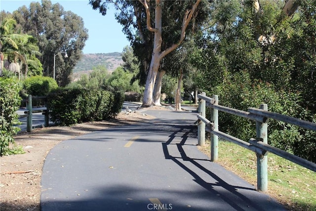 28021 Paseo Reposo, San Juan Capistrano, CA 92675 - view of asphalt road with street lighting and a mountain view