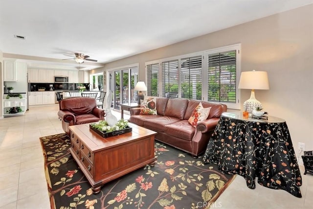 28021 Paseo Reposo, San Juan Capistrano, CA 92675 - living area featuring a ceiling fan and light tile patterned floors