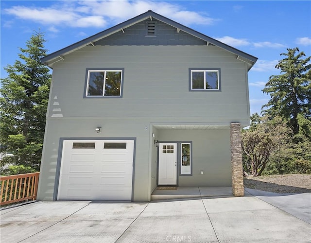 26182 Sky Ridge Dr, Twin Peaks, CA 92391 - view of front of property with an attached garage and driveway