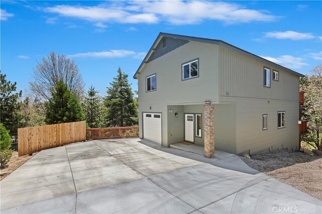 26182 Sky Ridge Dr, Twin Peaks, CA 92391 - view of property exterior featuring a garage and driveway