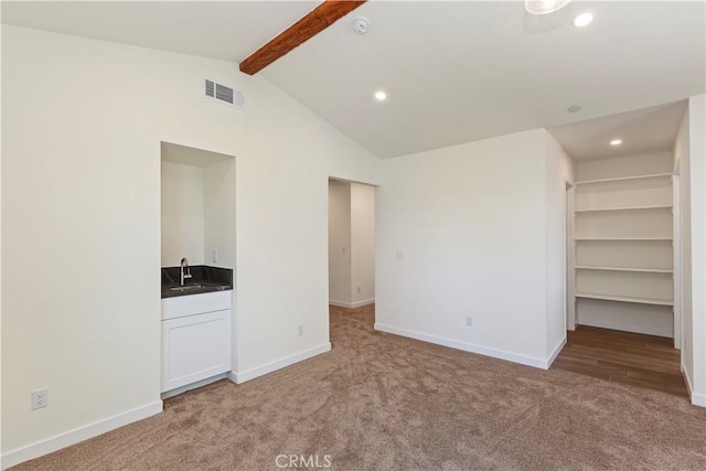 26182 Sky Ridge Dr, Twin Peaks, CA 92391 - unfurnished bedroom with light carpet, recessed lighting, and a walk in closet