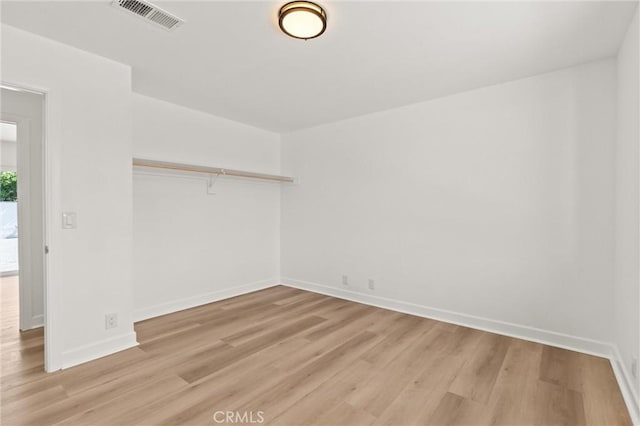 2852 E San Angelo Rd, Palm Springs, CA 92262 - empty room featuring light wood finished floors and baseboards
