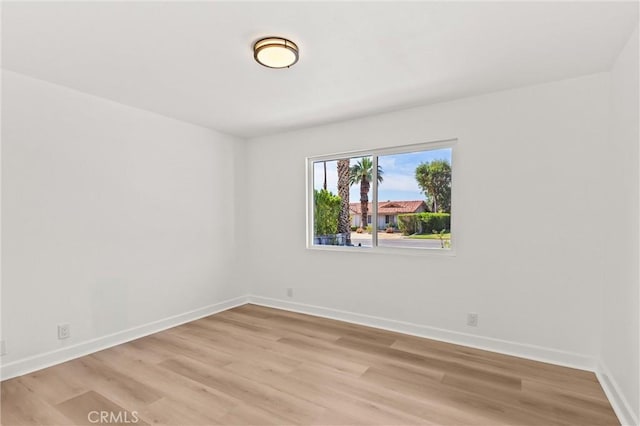 2852 E San Angelo Rd, Palm Springs, CA 92262 - unfurnished room featuring light wood finished floors and baseboards