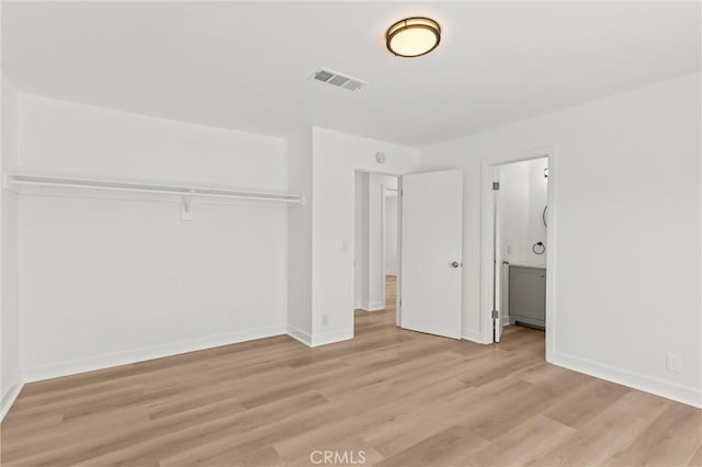 2852 E San Angelo Rd, Palm Springs, CA 92262 - unfurnished bedroom with light wood-style floors and baseboards