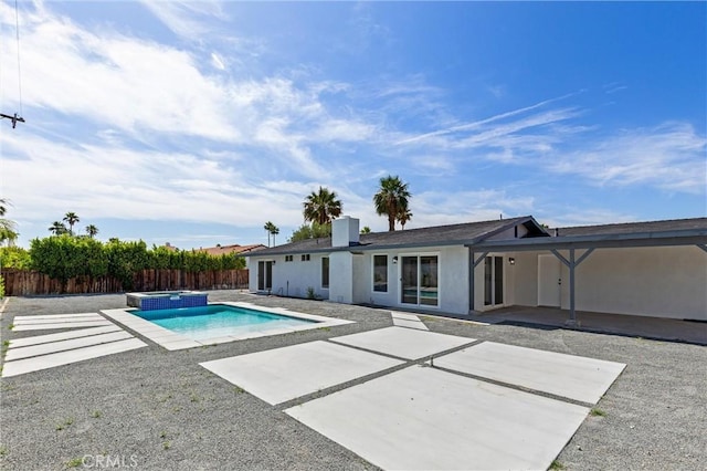 2852 E San Angelo Rd, Palm Springs, CA 92262 - view of swimming pool with a fenced backyard, a patio area, and a pool with connected hot tub