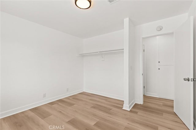 2852 E San Angelo Rd, Palm Springs, CA 92262 - spacious closet with light wood finished floors