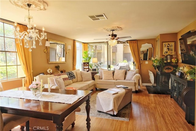 4140 Workman Mill Rd Unit 234, Whittier, CA 90601 - living room featuring a chandelier, wood finished floors, and a ceiling fan