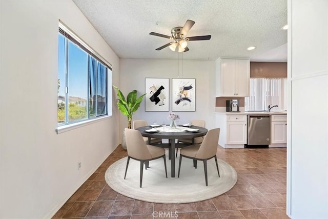 12976 Rhodes Pl, Chino, CA 91710 - dining area featuring a textured ceiling, a ceiling fan, and recessed lighting