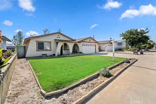 12976 Rhodes Pl, Chino, CA 91710 - view of front of home with an attached garage, concrete driveway, and stucco siding