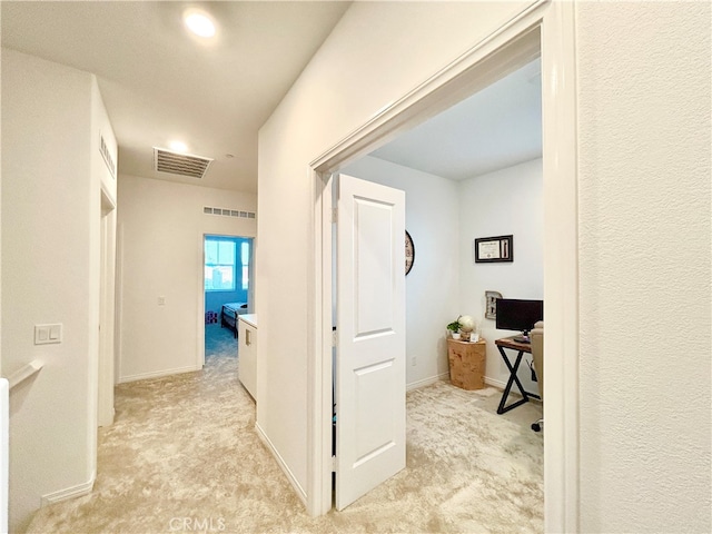 36351 Elizabeth Ln Unit 8105, Wildomar, CA 92595 - hallway featuring light colored carpet and a desk
