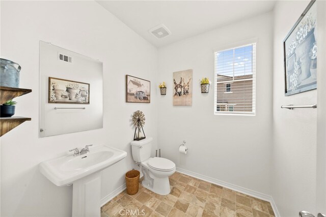 36351 Elizabeth Ln Unit 8105, Wildomar, CA 92595 - bathroom featuring baseboards and stone finish floors