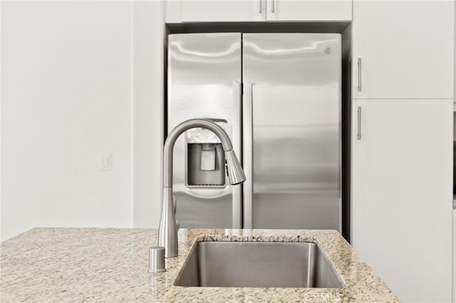 36351 Elizabeth Ln Unit 8105, Wildomar, CA 92595 - kitchen view of stainless steel fridge with ice dispenser and light stone counters
