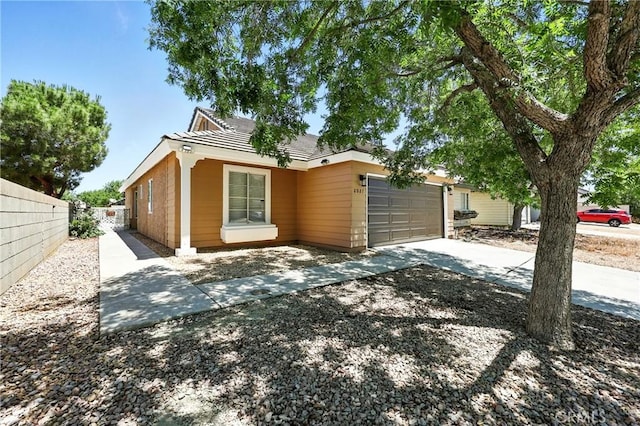 2027 Cape Cod Ln, Palmdale, CA 93550 - single story home with an attached garage and driveway