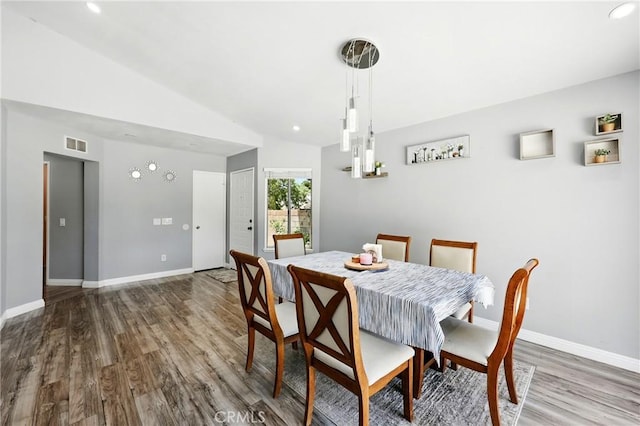 2027 Cape Cod Ln, Palmdale, CA 93550 - dining room featuring wood finished floors, vaulted ceiling, and recessed lighting
