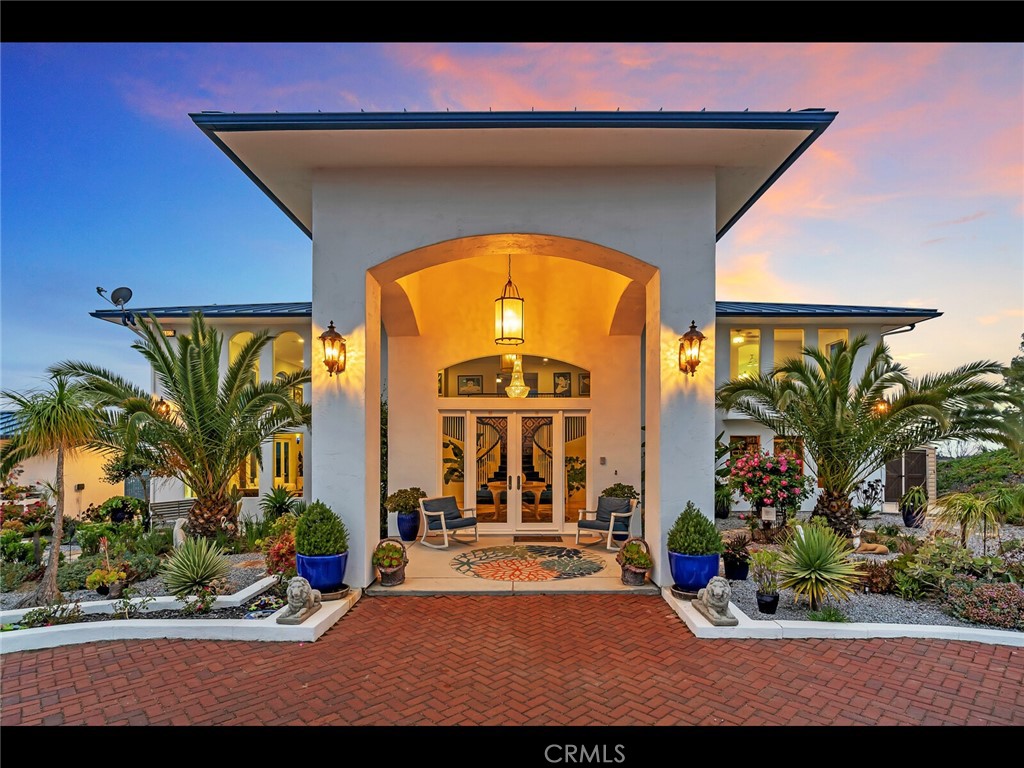 31460 Aquaduct Rd, Bonsall, CA 92003 - property entrance with french doors and stucco siding