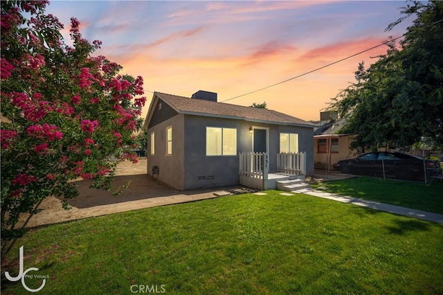 531 7th, Bakersfield, CA 93304 - rear view of house featuring stucco siding