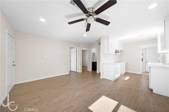 531 7th, Bakersfield, CA 93304 - unfurnished living room featuring recessed lighting, light wood-style floors, and a ceiling fan