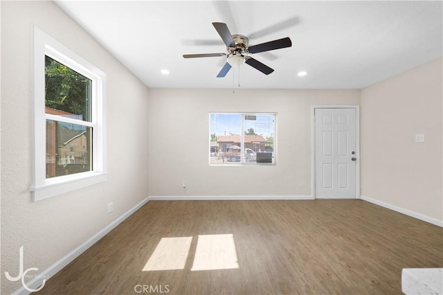531 7th, Bakersfield, CA 93304 - spare room with healthy amount of natural light, wood finished floors, ceiling fan, and recessed lighting