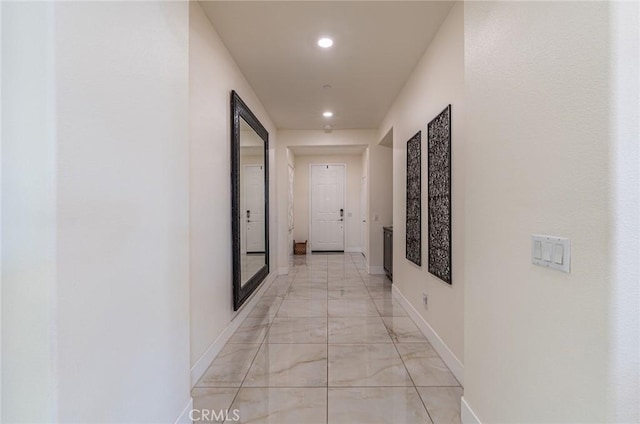 13211 Baxter Springs Dr, Rancho Cucamonga, CA 91739 - corridor featuring light marble finish floors and recessed lighting