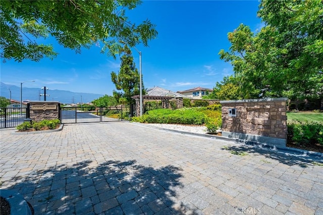 13211 Baxter Springs Dr, Rancho Cucamonga, CA 91739 - gate with a mountain view
