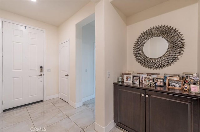 13211 Baxter Springs Dr, Rancho Cucamonga, CA 91739 - foyer entrance featuring light marble finish flooring and baseboards