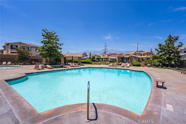 13211 Baxter Springs Dr, Rancho Cucamonga, CA 91739 - community pool featuring a patio area and a residential view