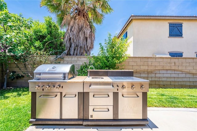 13211 Baxter Springs Dr, Rancho Cucamonga, CA 91739 - view of patio / terrace featuring exterior kitchen and a sink