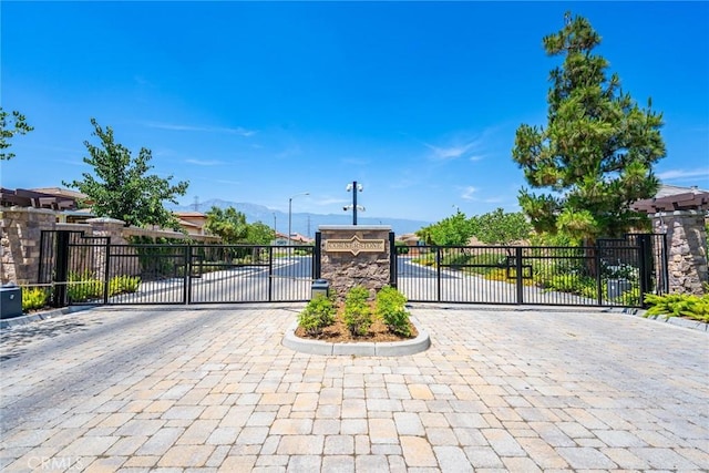 13211 Baxter Springs Dr, Rancho Cucamonga, CA 91739 - gate with a mountain view