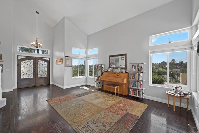3676 Valley Rd, Bonita, CA 91902 - foyer entrance with hardwood / wood-style flooring, high vaulted ceiling, a chandelier, and french doors