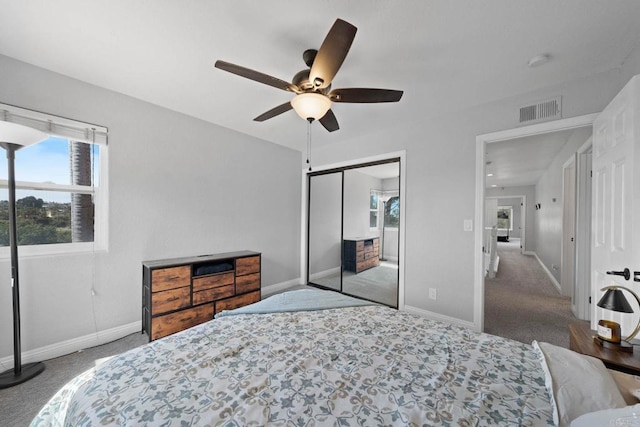 3676 Valley Rd, Bonita, CA 91902 - bedroom with carpet, a closet, and a ceiling fan