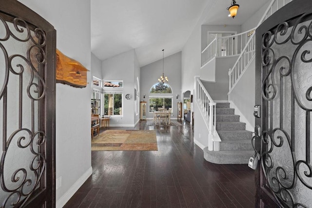 3676 Valley Rd, Bonita, CA 91902 - entrance foyer with stairs, a chandelier, high vaulted ceiling, and wood-type flooring
